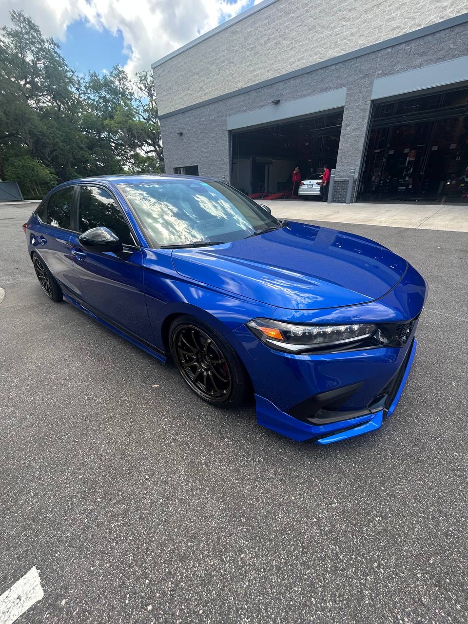 Mobile car detailing results in Kissimmee, FL - Aventurine Blue Honda Civic Si after full detail