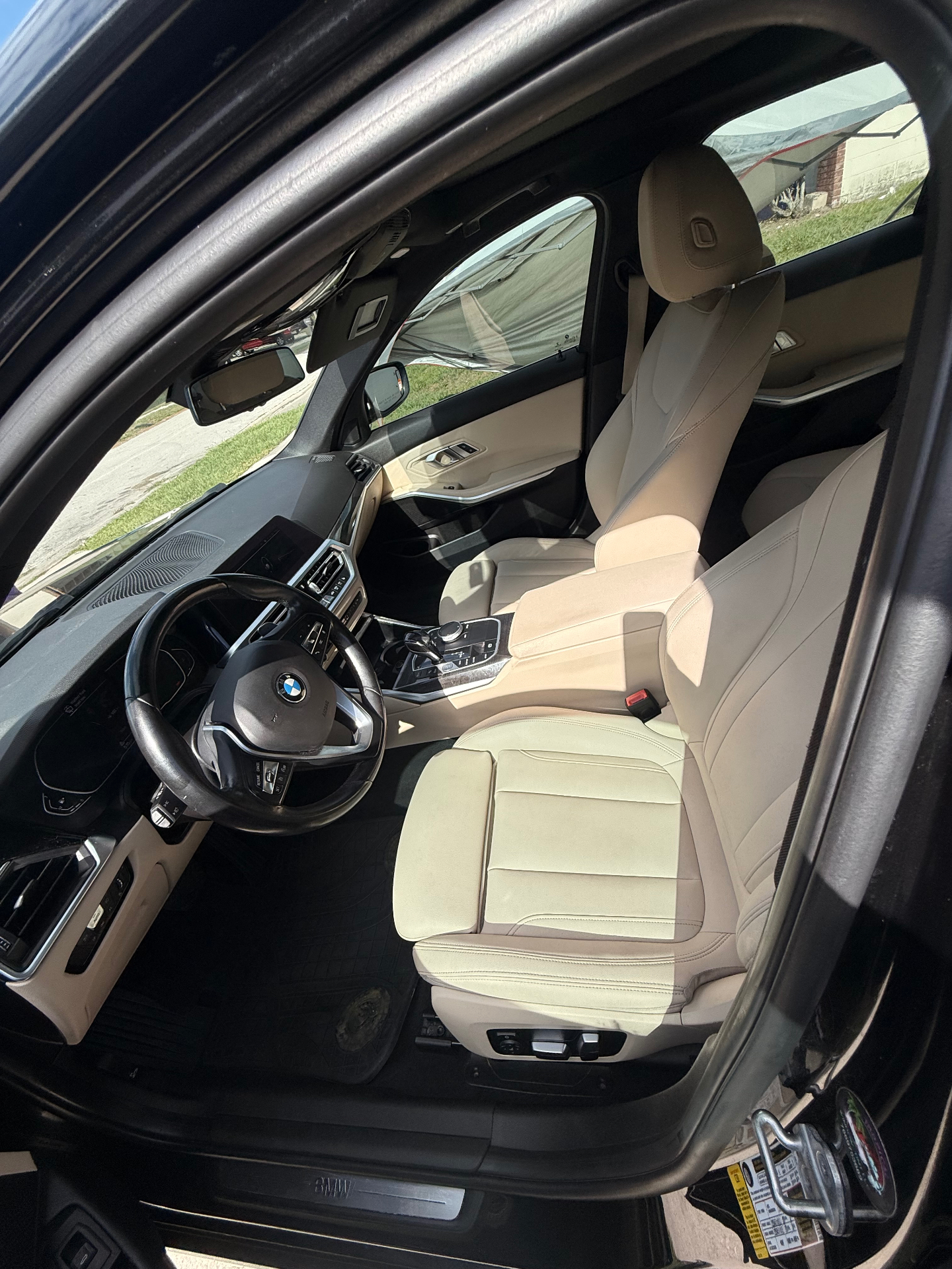 BMW tan leather interior detailed by JDM Wash in Kissimmee, FL