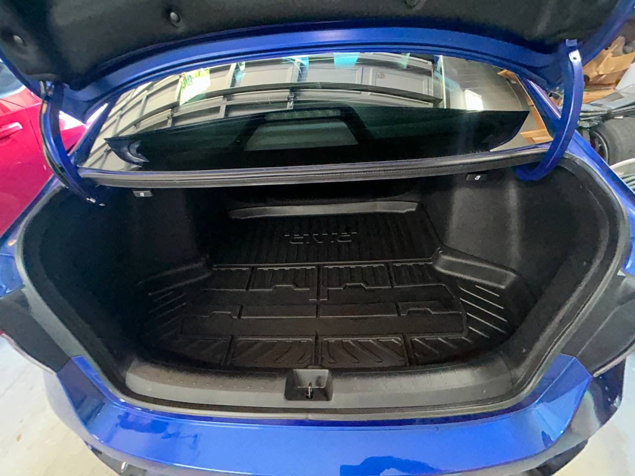 Blue Honda Civic Si covered in foam during a JDM Wash mobile exterior wash